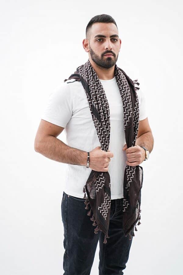 Jenin Brown Hirbawi® Kufiya Man Hold